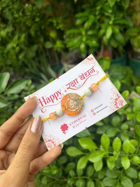 Ganpati ji- orange gold resin rakhi🧡✨